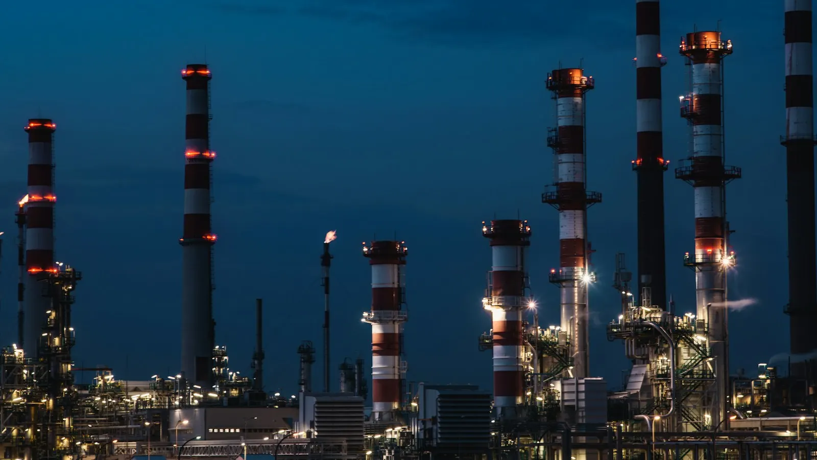 Process plant with distillation columns at dusk