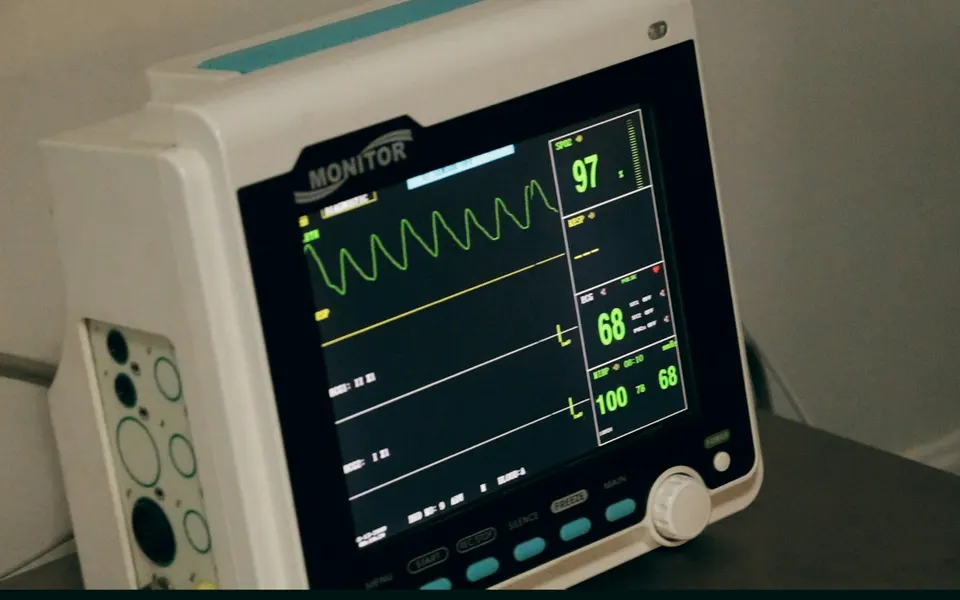 A patient monitor showing vital signs
