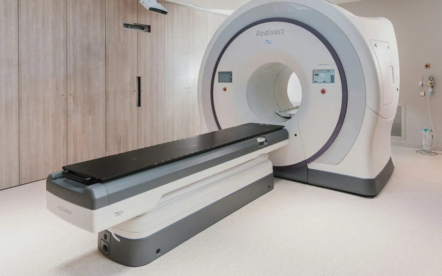 An imaging and treatment scanner in an empty hospital room